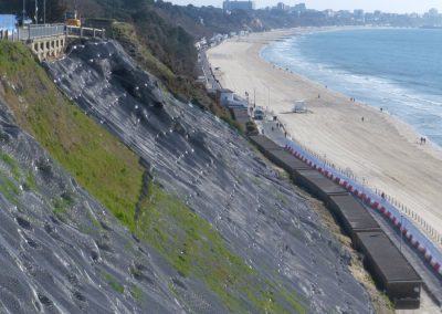 April: the hydro-seeded cliff face shows signs of vegetation